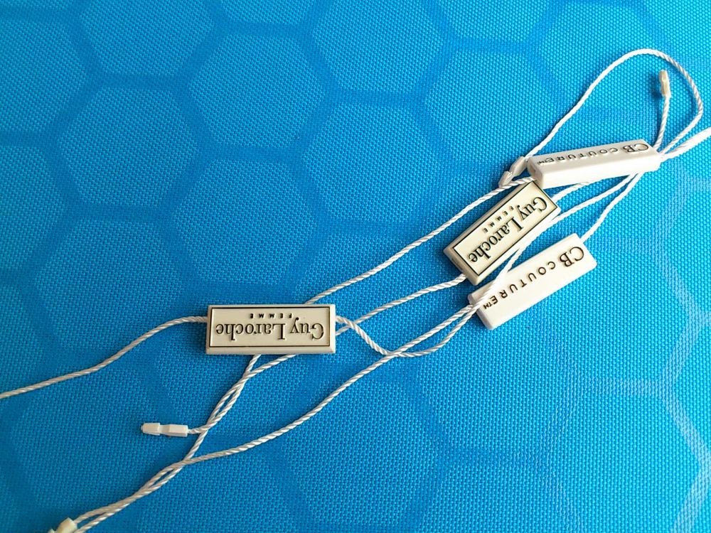 东莞厂家专业生产吊牌标识 服装吊粒 滴胶吊粒 箱包装饰吊粒